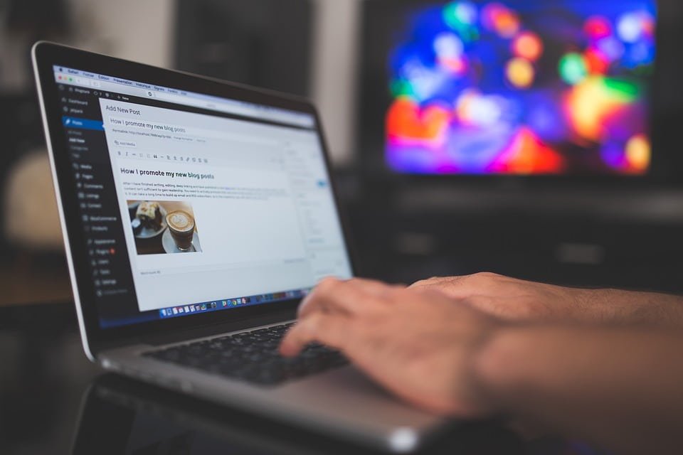 laptop with wordpress admin on screen